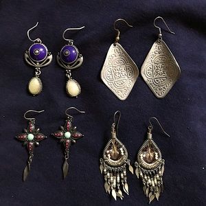 4 pair of vintage earrings to be sold as a lot.